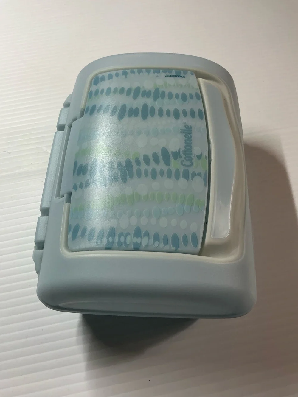 Cottonelle Mostly Colored Blue w/ Green with Word Logo Print Top Pop-Up Dispense